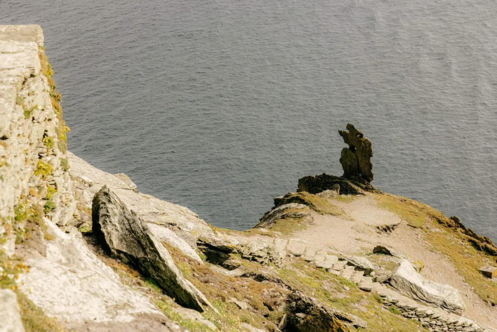 Dramatic coastal view of Skellig Michael, showing rugged cliffs and the ocean. Consider our Skellig Michael Landing Tour.
