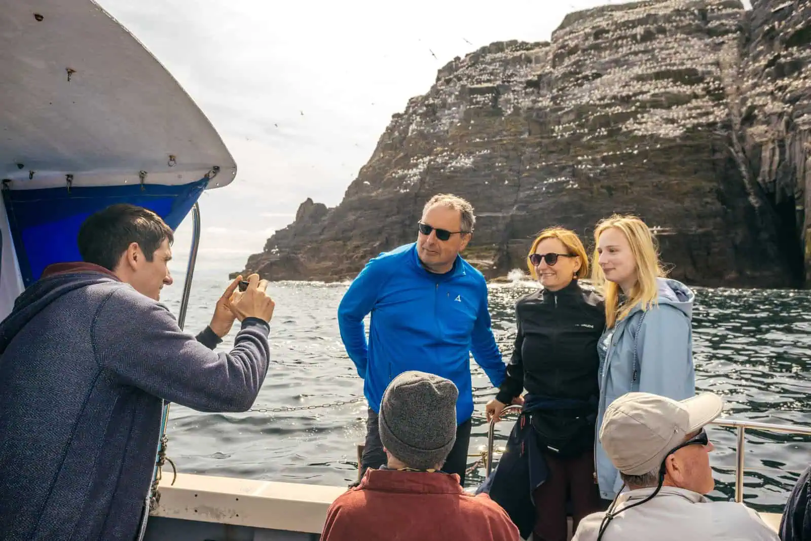 Passengers on deck enjoying the view of the Skelligs.